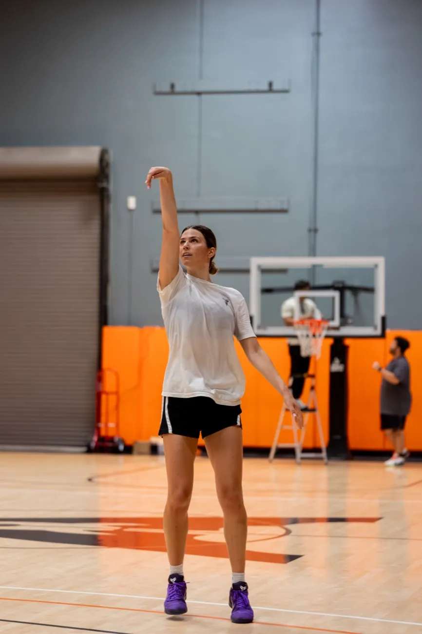 Rising into a jumper with a full follow-through
